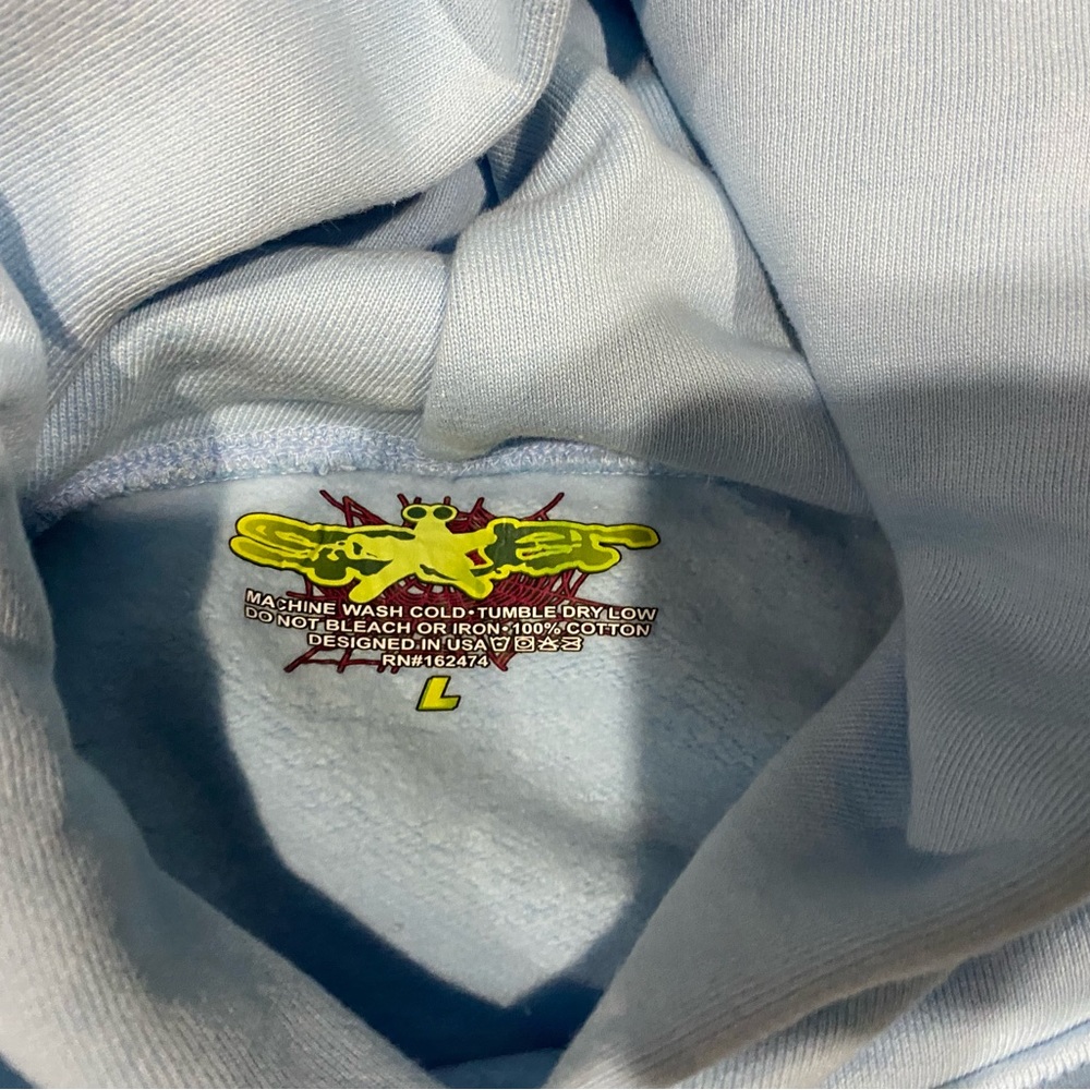 Light blue sp5der hoodie it has never bein worn. Brand new